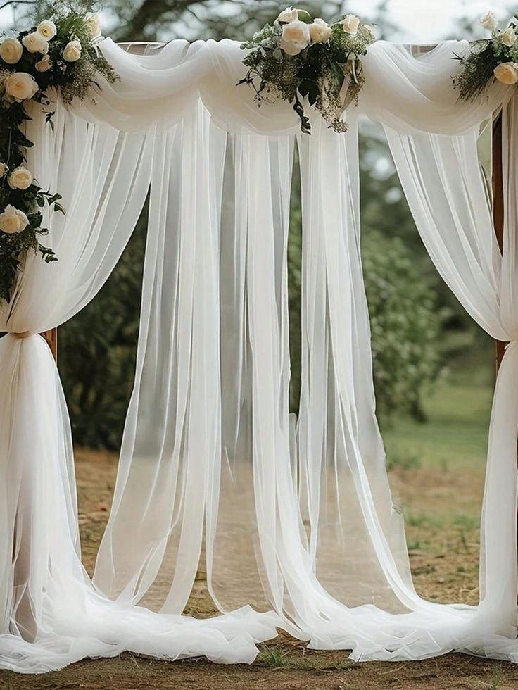 Wedding Decor Ideas That Look Luxurious on a Budget soft tulle fabric roll for draping. by decoor with mee